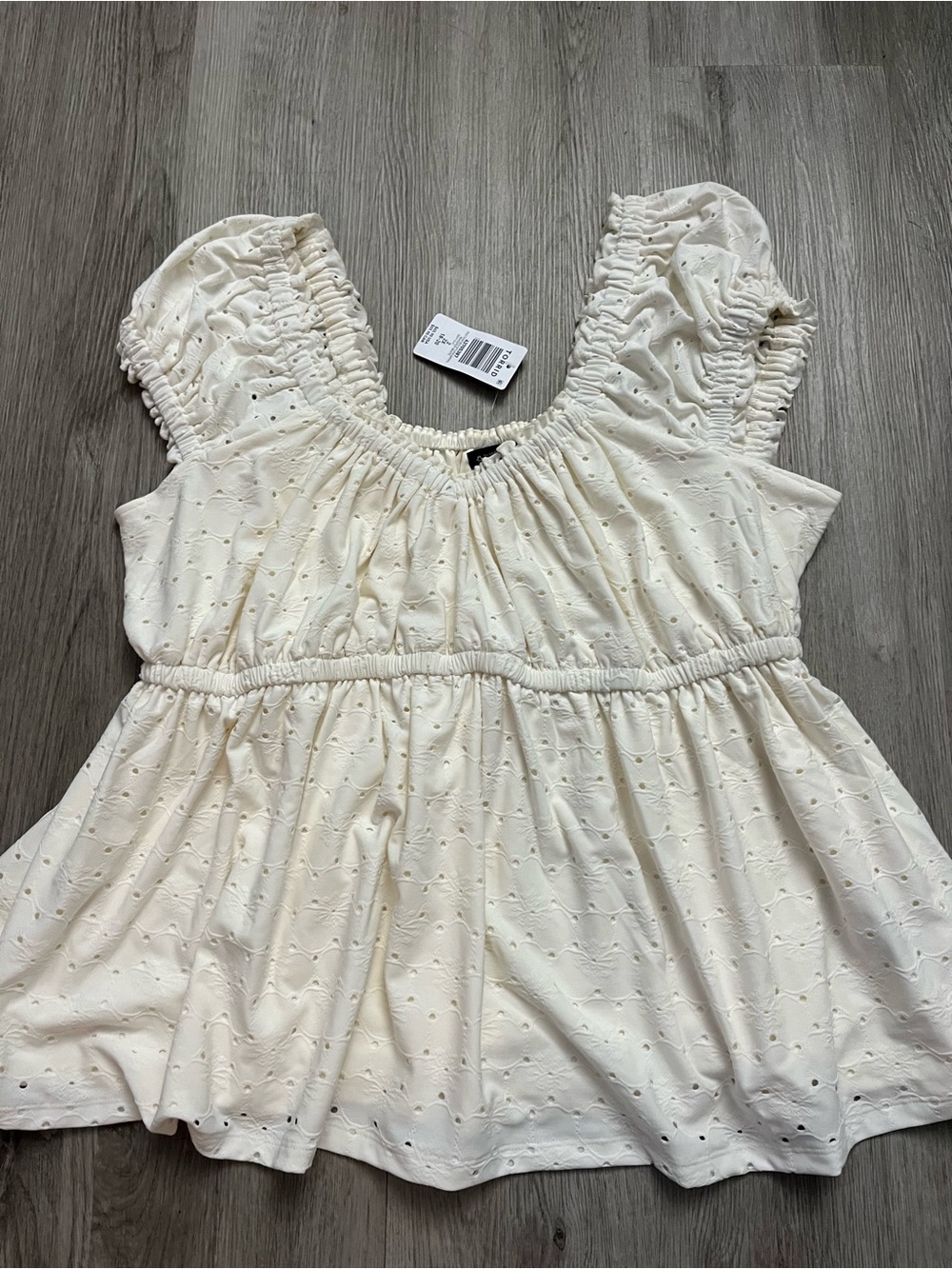 363–NWT Torrid Cream Eyelet Peplum Top